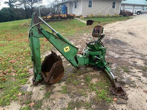 skid steer backhoe attachment john deer|john deere 165 backhoe attachment.